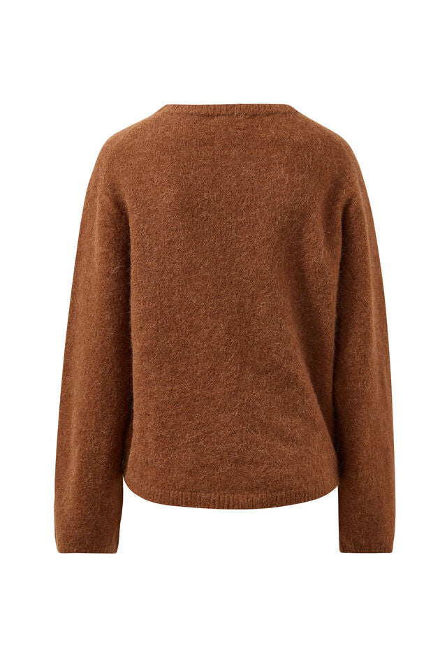Brown sweater on a white background