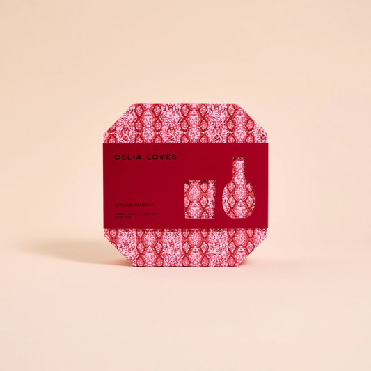 Red packaging with white pattern and 'Celia Loves' branding on a beige background