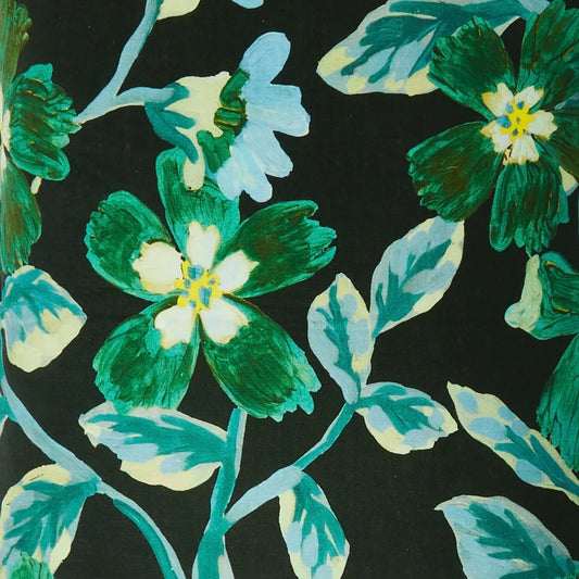 Floral pattern with green and blue flowers on a black background
