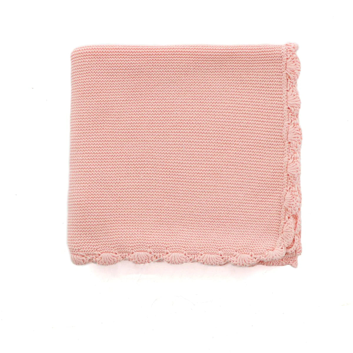 Pink knitted blanket on a white background