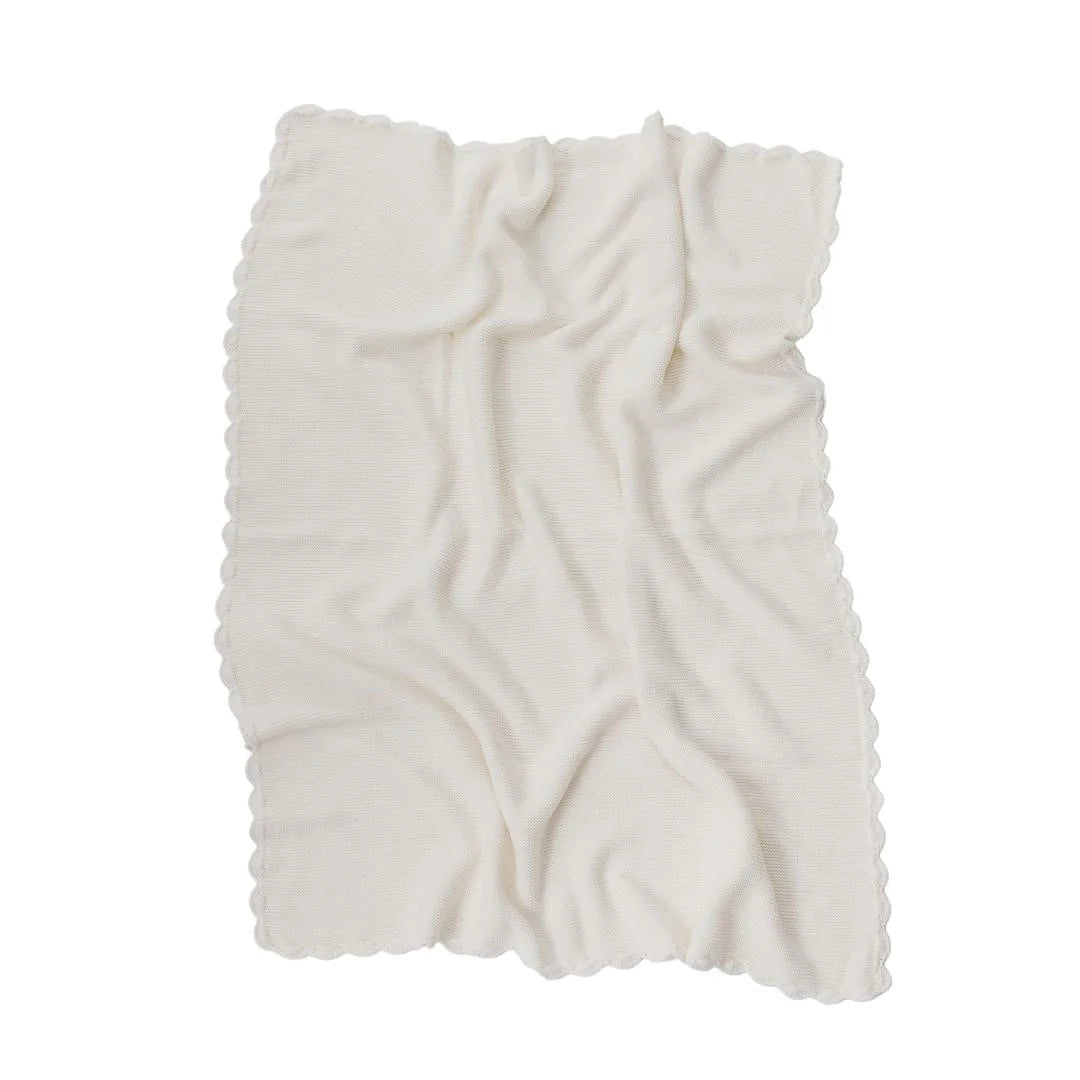 White textured blanket on a white background