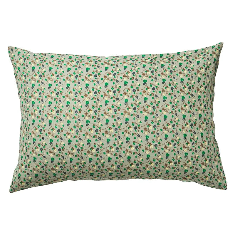 Patterned floral standard pillow with a green base, on a white background.