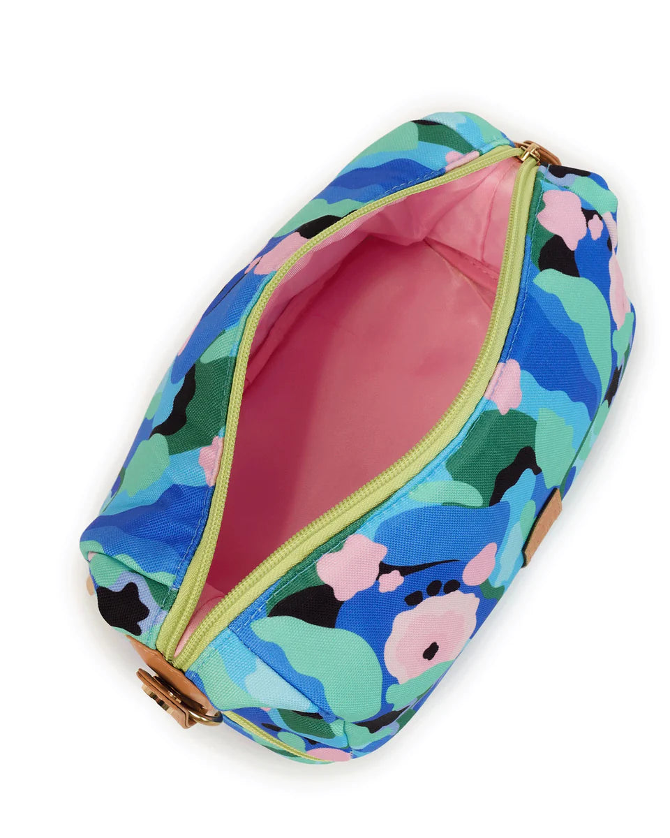 Close up of open zip, showing pink lining inside.