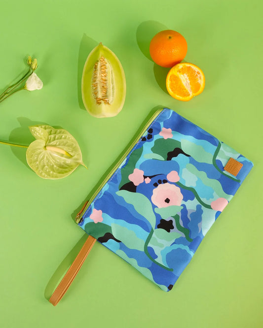 Floral notebook on a green background with fruits