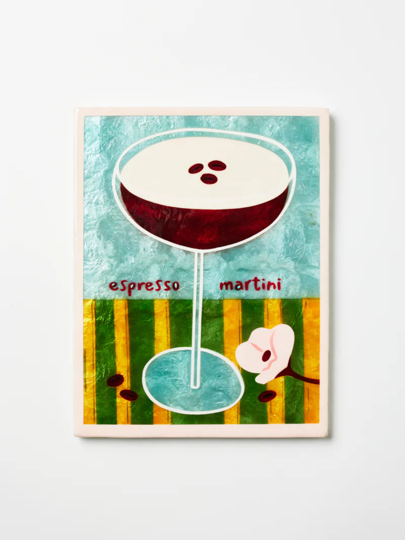 Illustration of an Espresso Martini with a cherry on top against a colorful background.