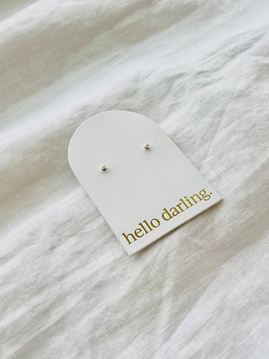 Petite pearl stud on earring card with 'hello darling' text on a white fabric background. Available at Hello Darling, Albury Wodonga Beechworth and Bright.