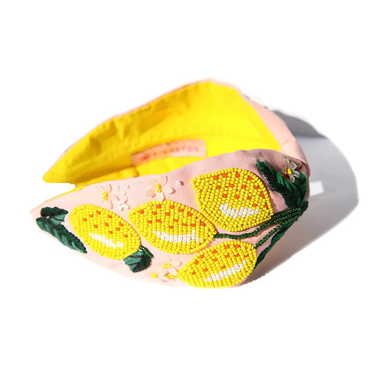 Lemon beaded detail headband with green leaves and pale pink base fabric.