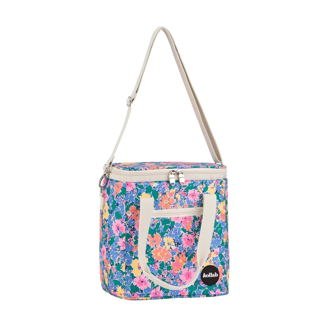Floral-patterned bag with a strap on a white background