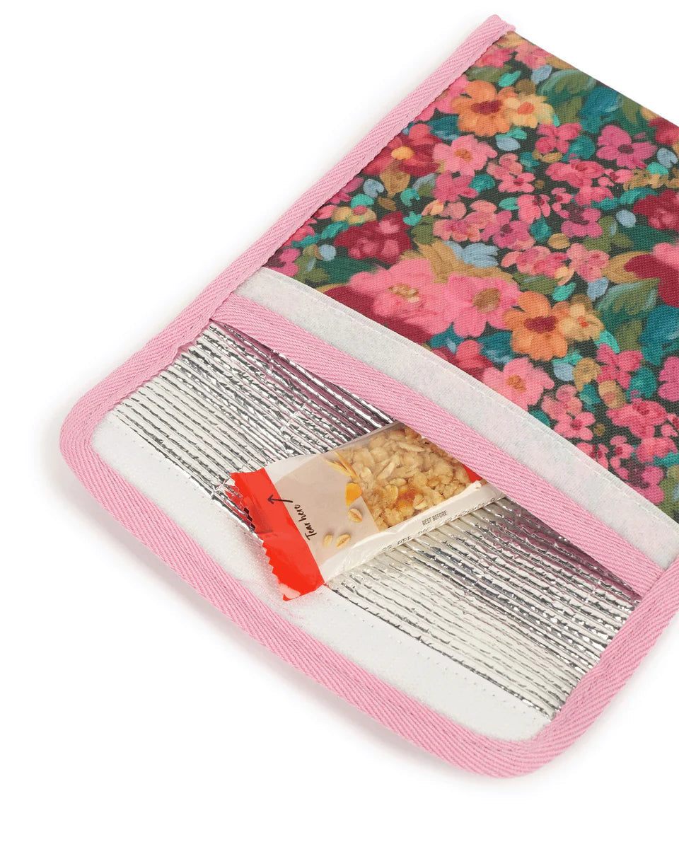 Snack bag laid out open with muesli bar poking out of insulated pouch.