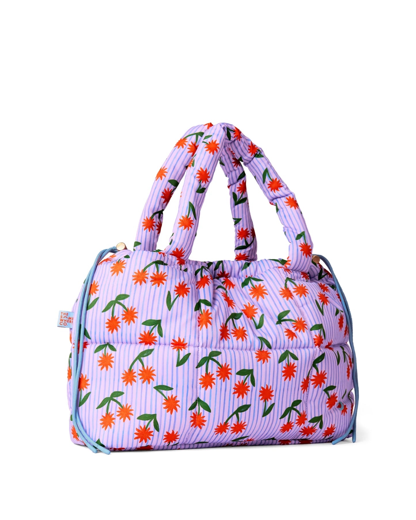 Floral patterned handbag on a white background