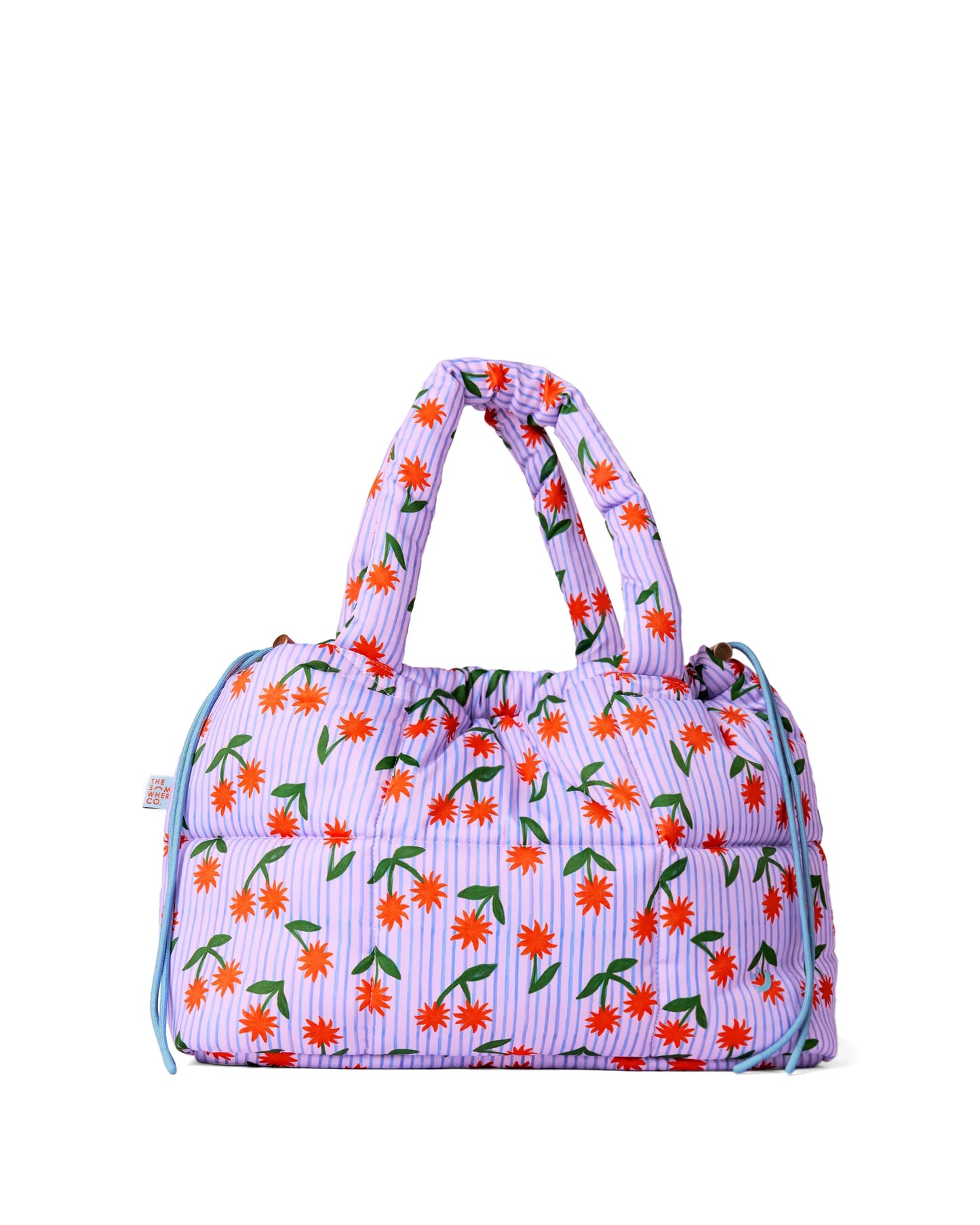 Floral patterned handbag on a white background
