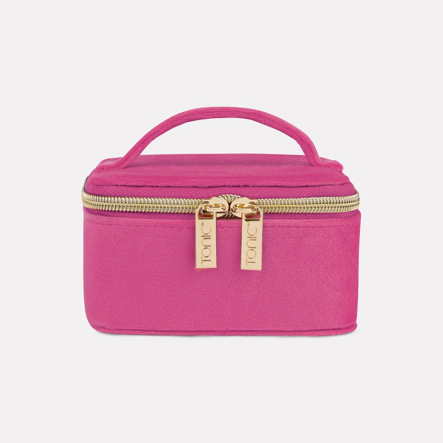 Pink cosmetic bag with gold zipper on a light gray background