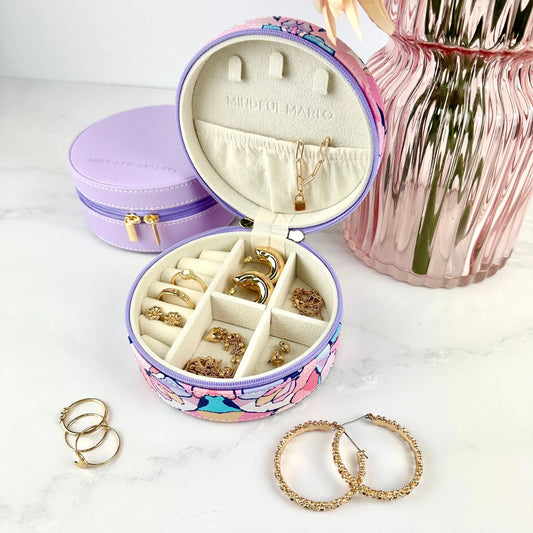 Jewelry organizer with jewelry on a white surface