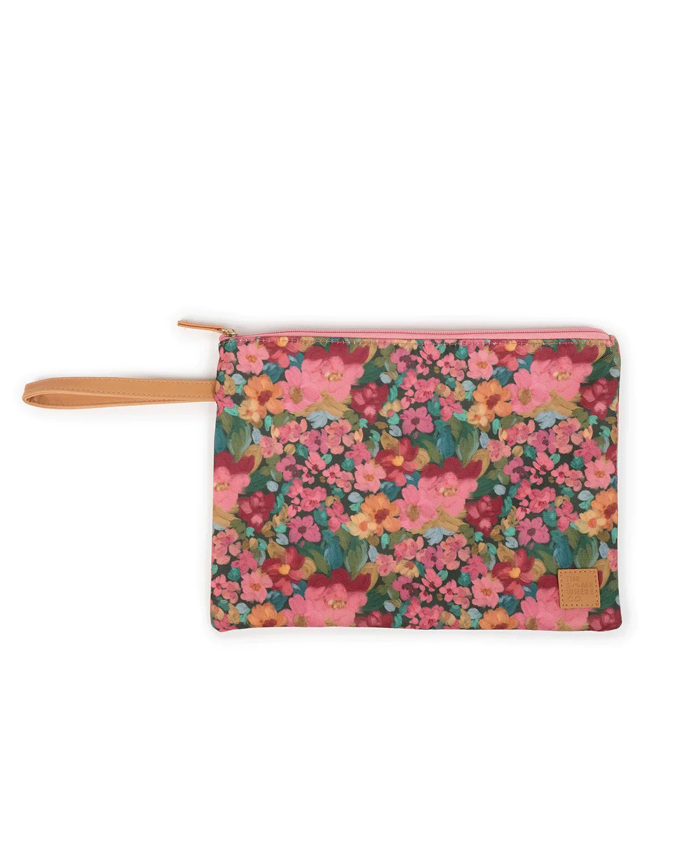 Floral patterned pouch with a brown handle on a white background