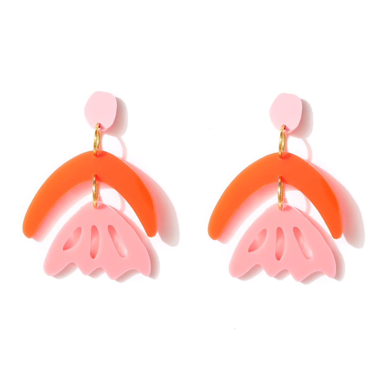 A pair of earrings with pink and red colors, consisting of three linked arch-shaped pieces.