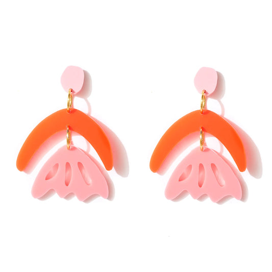 A pair of earrings with pink and red colors, consisting of three linked arch-shaped pieces.
