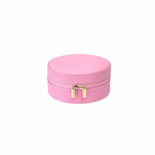 Pink jewelry box with gold zipper on a white background