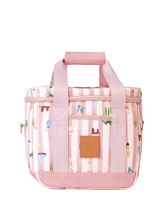 Pink patterned bag with a visible brand label on a light gray background
