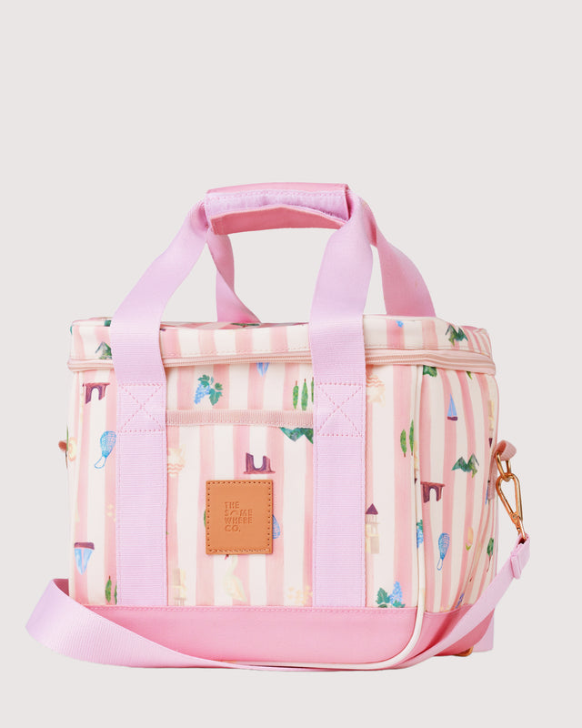 Pink and white striped bag with castle design on a light gray background