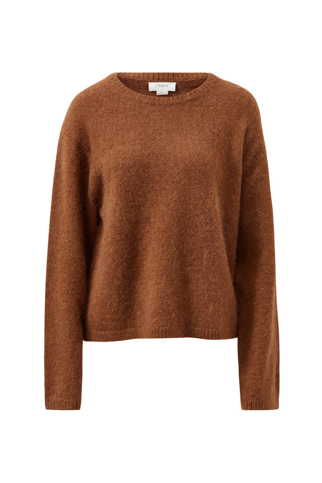 Brown sweater on a white background