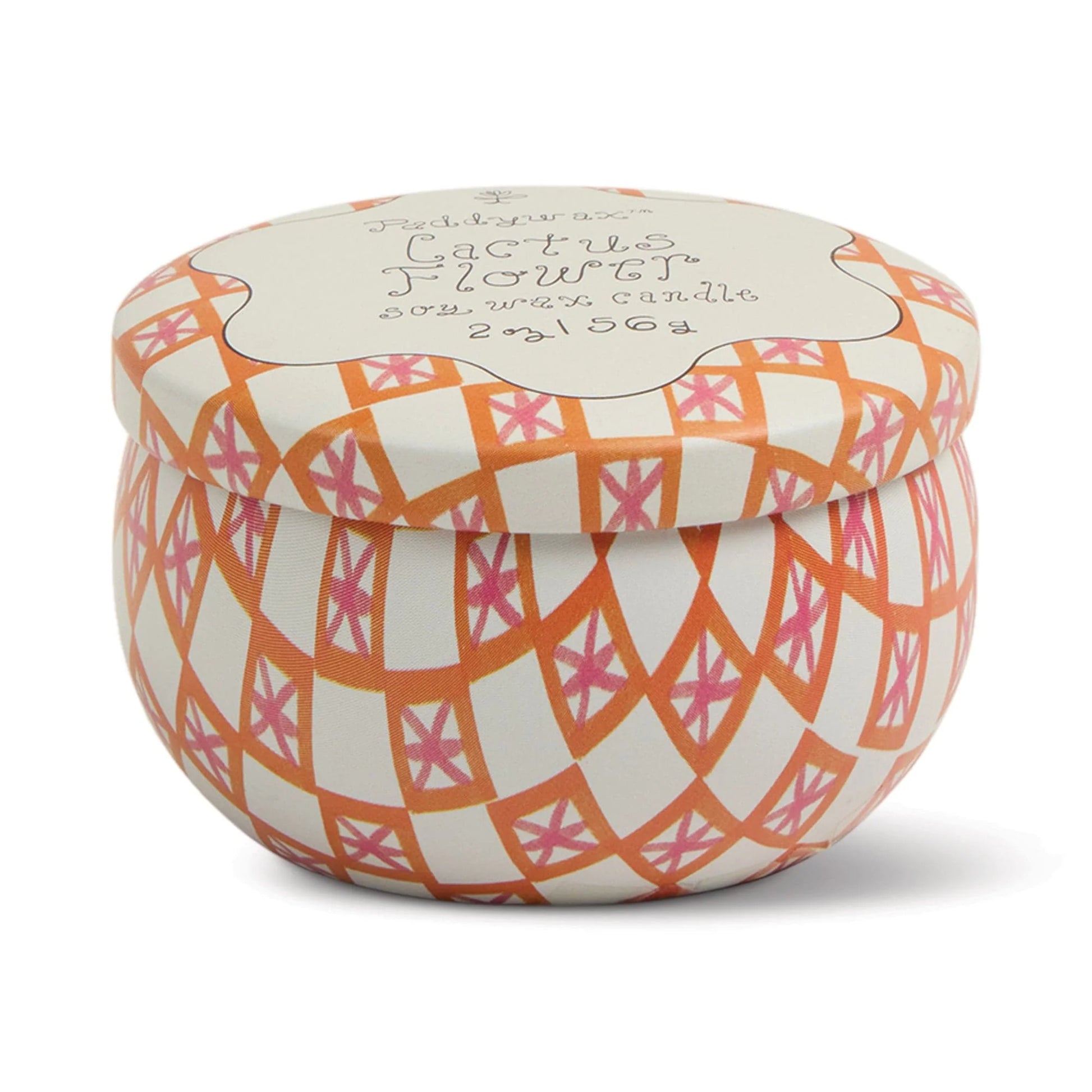 Decorative candle container with geometric pattern on a white background