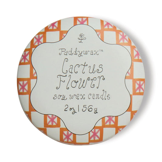 Paddywax Lactus Flower candle packaging with a decorative label on a white background