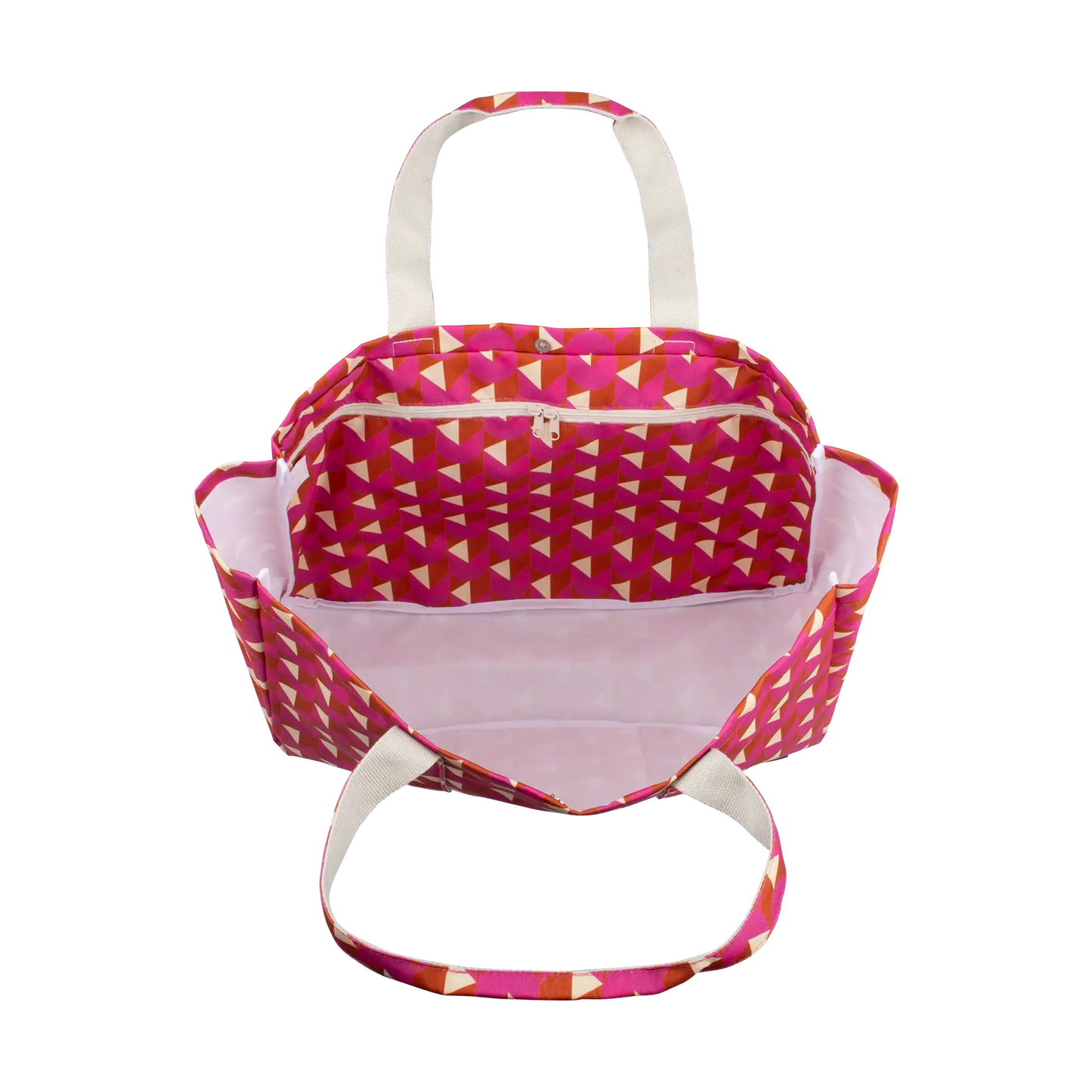 A tote bag with a geometric pink, orange, and beige triangle pattern, featuring cream-colored handles and a light pink interior, shown against a plain white background.