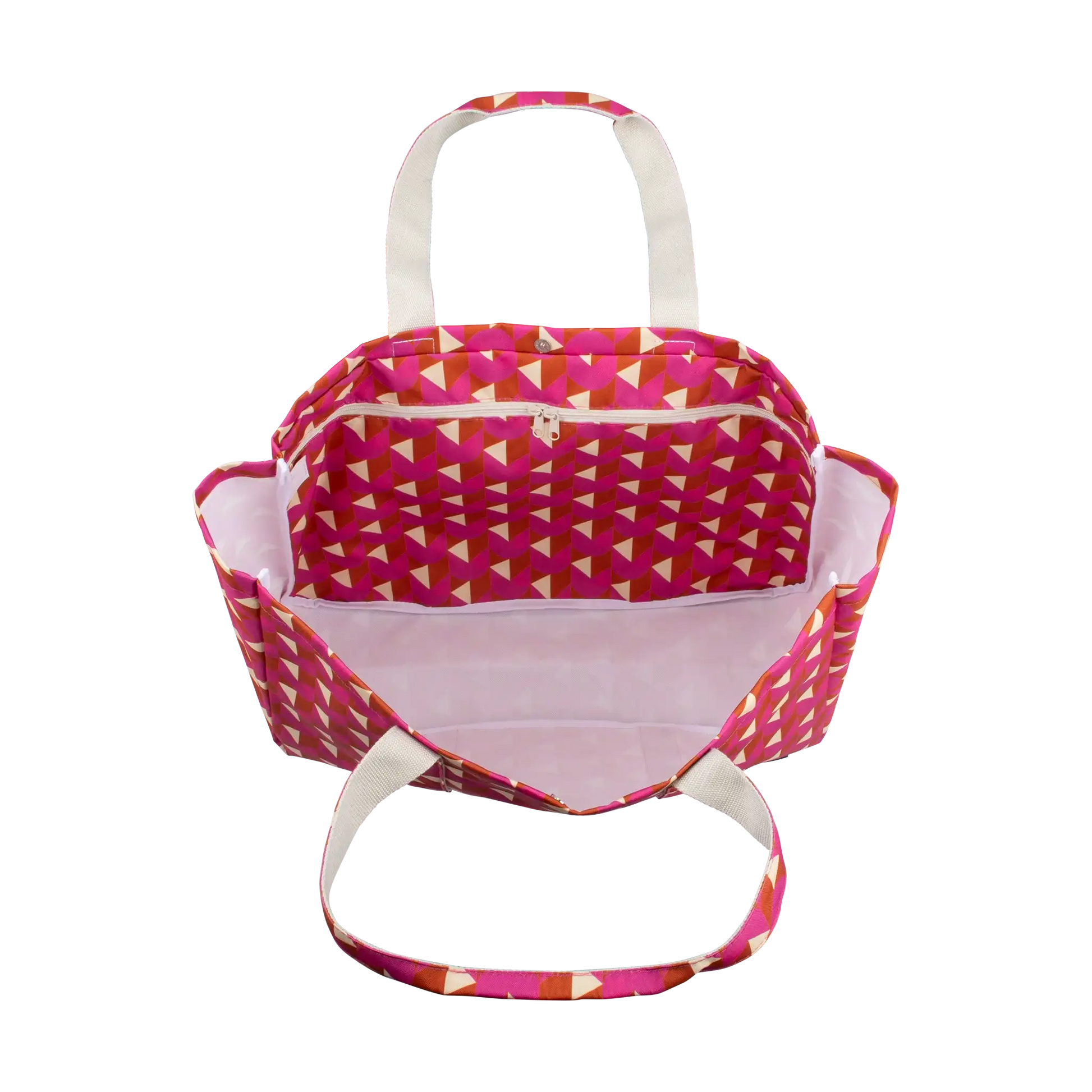 A tote bag with a geometric pink, orange, and beige triangle pattern, featuring cream-colored handles and a light pink interior, shown against a plain white background.
