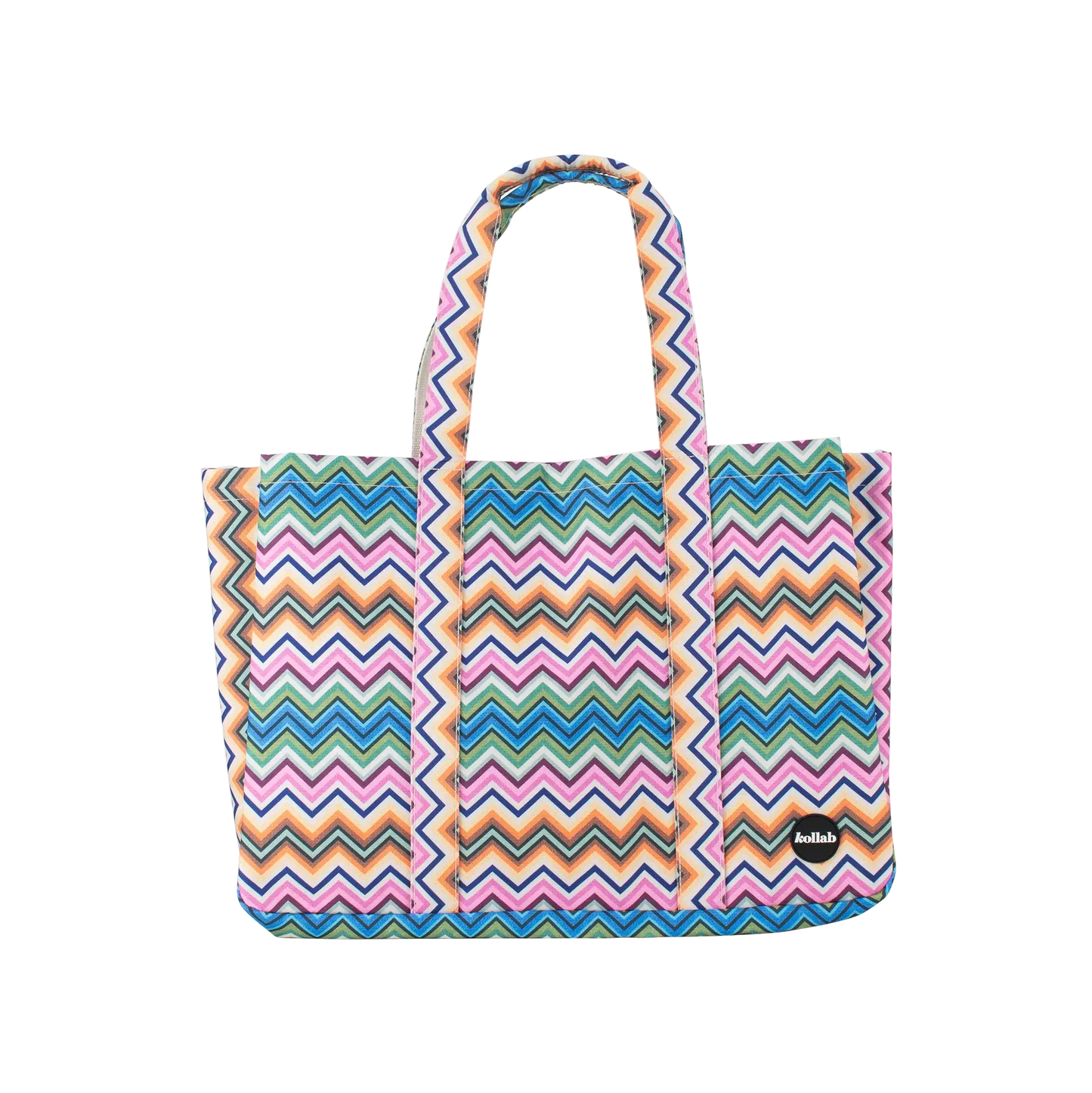 A tote bag with a colorful chevron zigzag pattern in pink, blue, orange, and green, featuring two top handles and a small black brand patch on the lower right side.