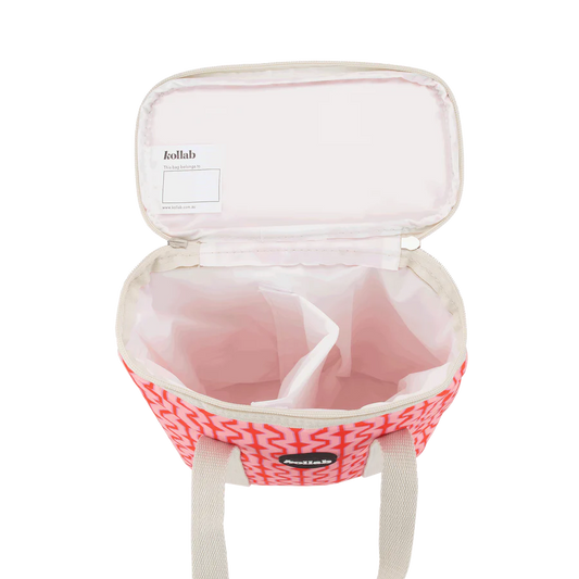 Inside of cooler bag shows removable white divider and lining