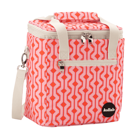 Pink patterned cooler bag with a visible brand logo on a transparent background