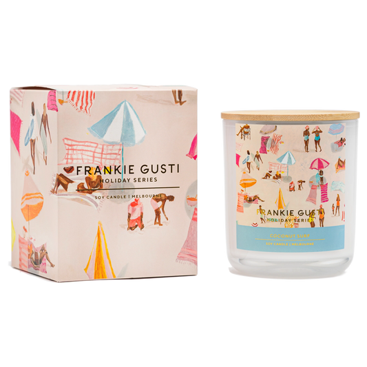 Frankie Gusti candle and packaging with holiday-themed illustrations on a white background