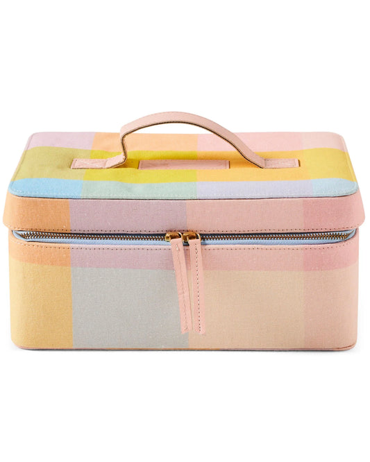 A toiletry case with a tartan pattern in hues of green, blue, pink, and purple, featuring blue zip trim and pink leather details.