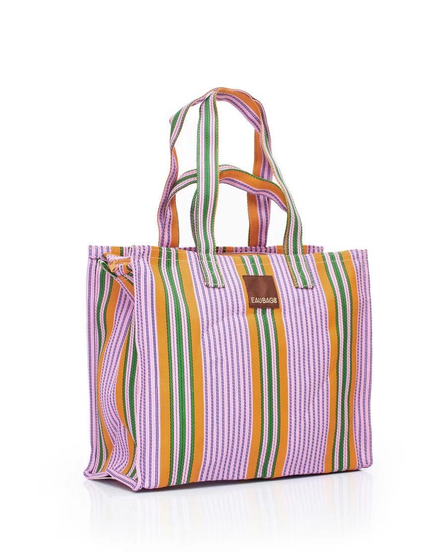 A striped bag with double handles - shoulder and carry height sits with white background. Bag features purple, green, orange and black details. 