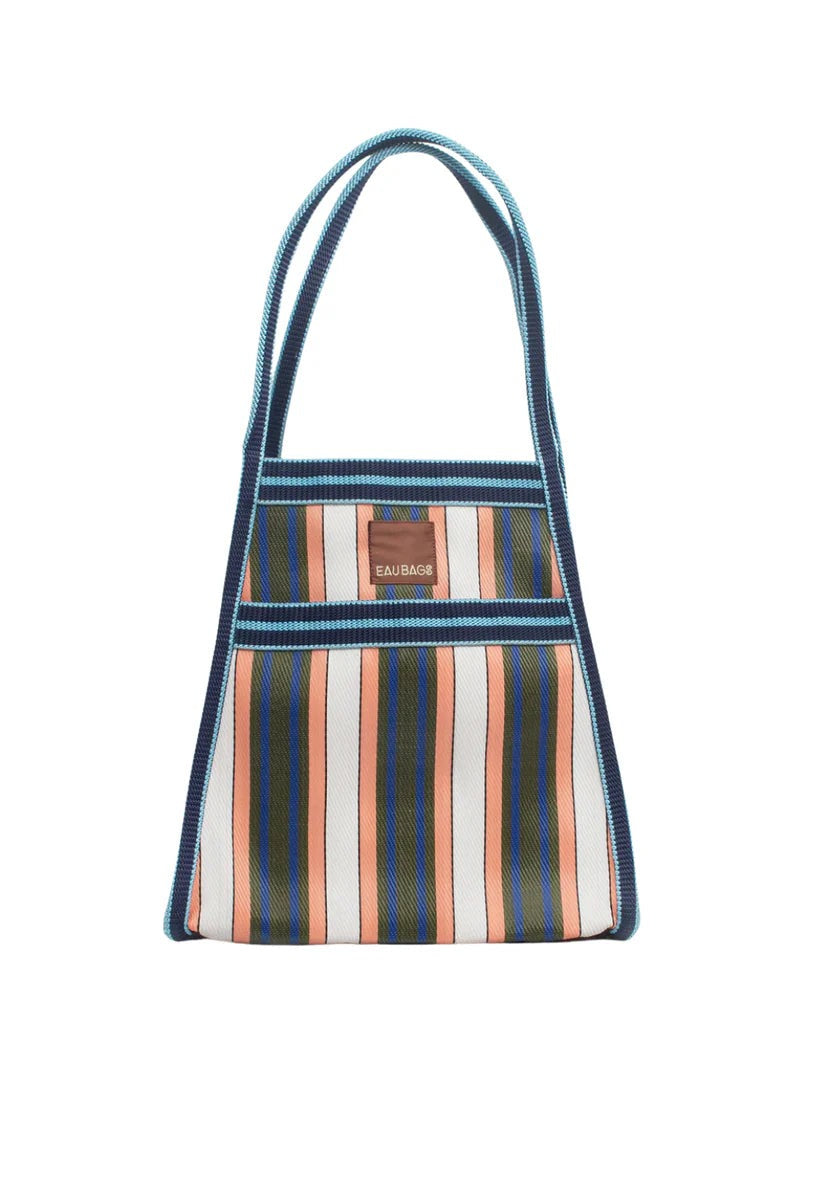 Striped shoulder carry bag with EAU Bag logo on front. Bag has green, peach, blue and white stripe pattern. 