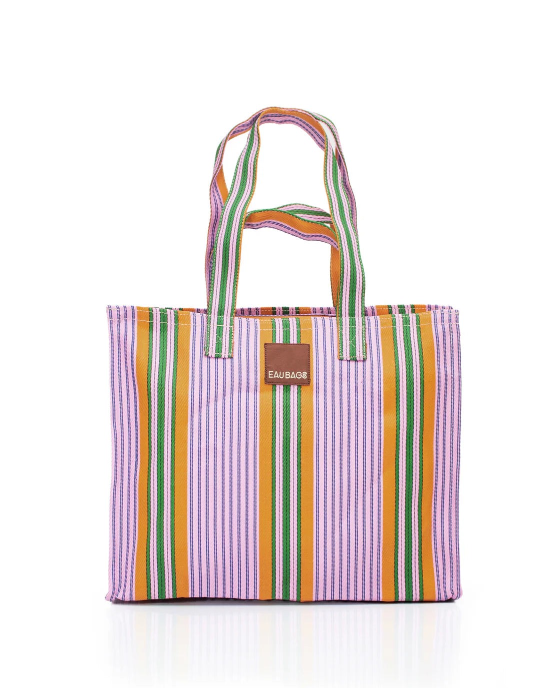 A bag sits with white background, bag is striped with purple, green, orange and black stripe details. Eau Bag branding sits at front of bag.