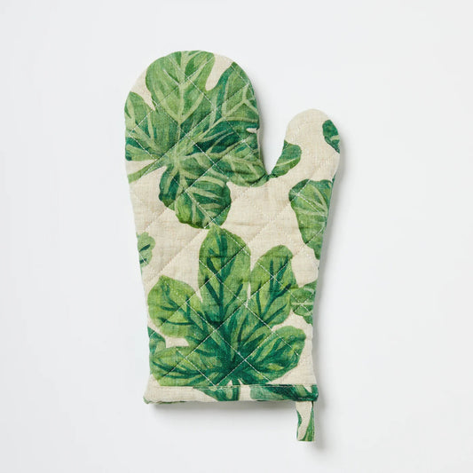 Oven mitt with green leaf pattern on a white background