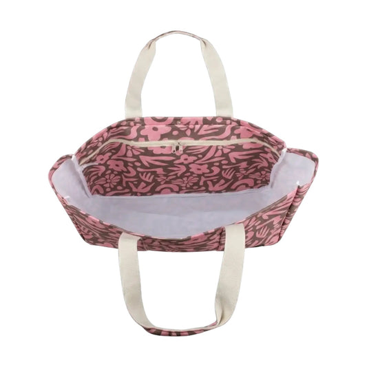 A pink and brown patterned tote bag with cream-colored handles, shown from a top-down view on a white background.