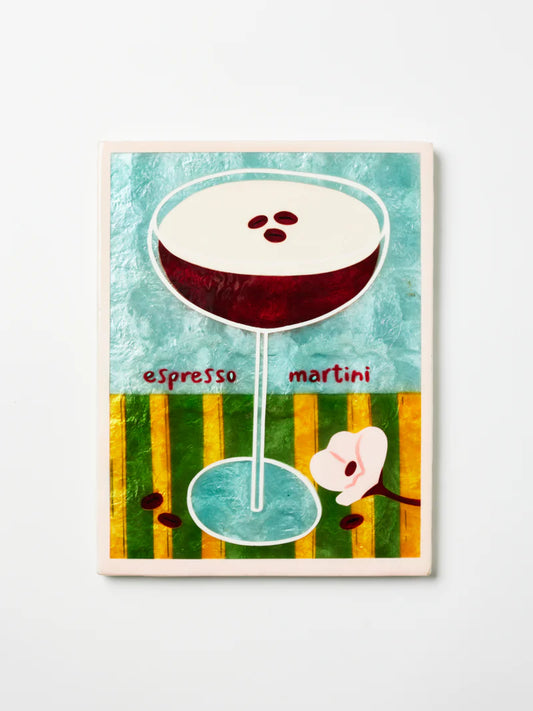 Illustration of an Espresso Martini with a cherry on top against a colorful background.