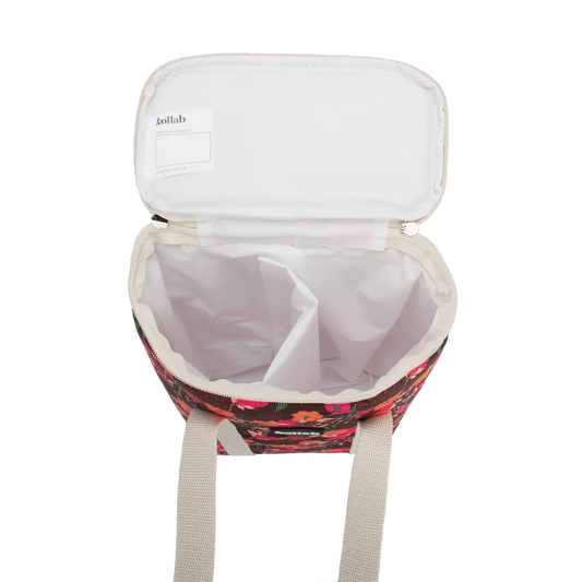 Floral-patterned cooler bag with a white lid on a white background