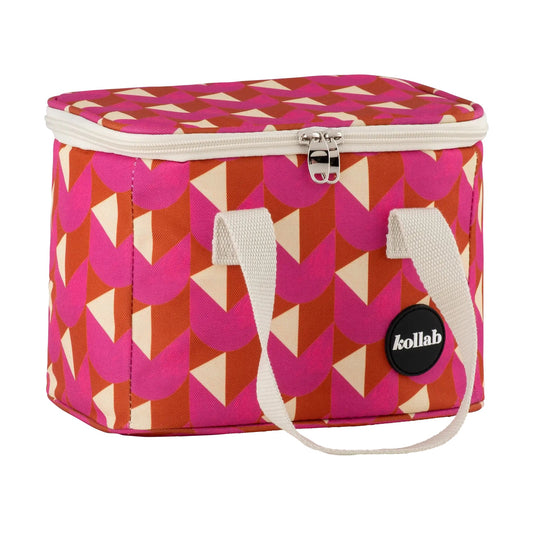 Lunch bag with pink, orange, cream pattern with cream handles and black logo.