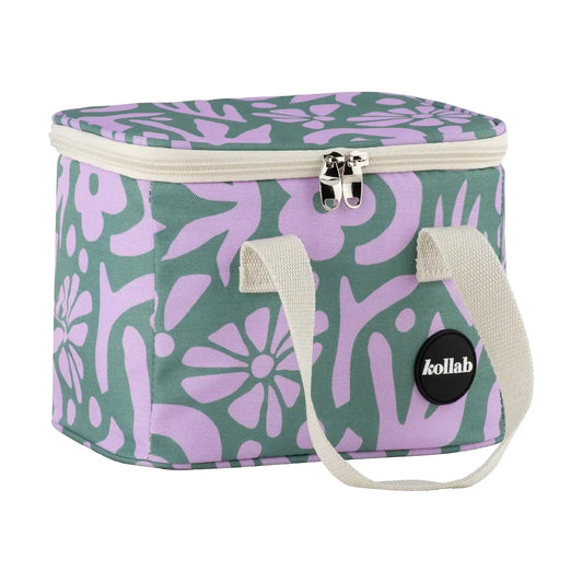 Lunch bag with silver zip, cream handles, black kollab logo and pattern is green and purple print.