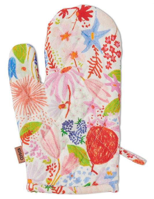 Floral patterned oven mitt on a white background