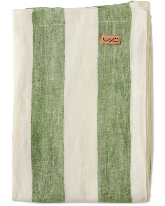 A folded linen kitchen towel with vertical stripes in sage green and cream, featuring a small brown leather brand patch that reads 'KD6CO'.