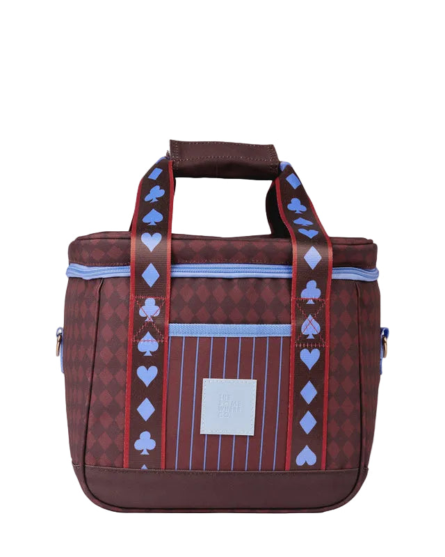 Patterned bag with card suit symbols on a beige background