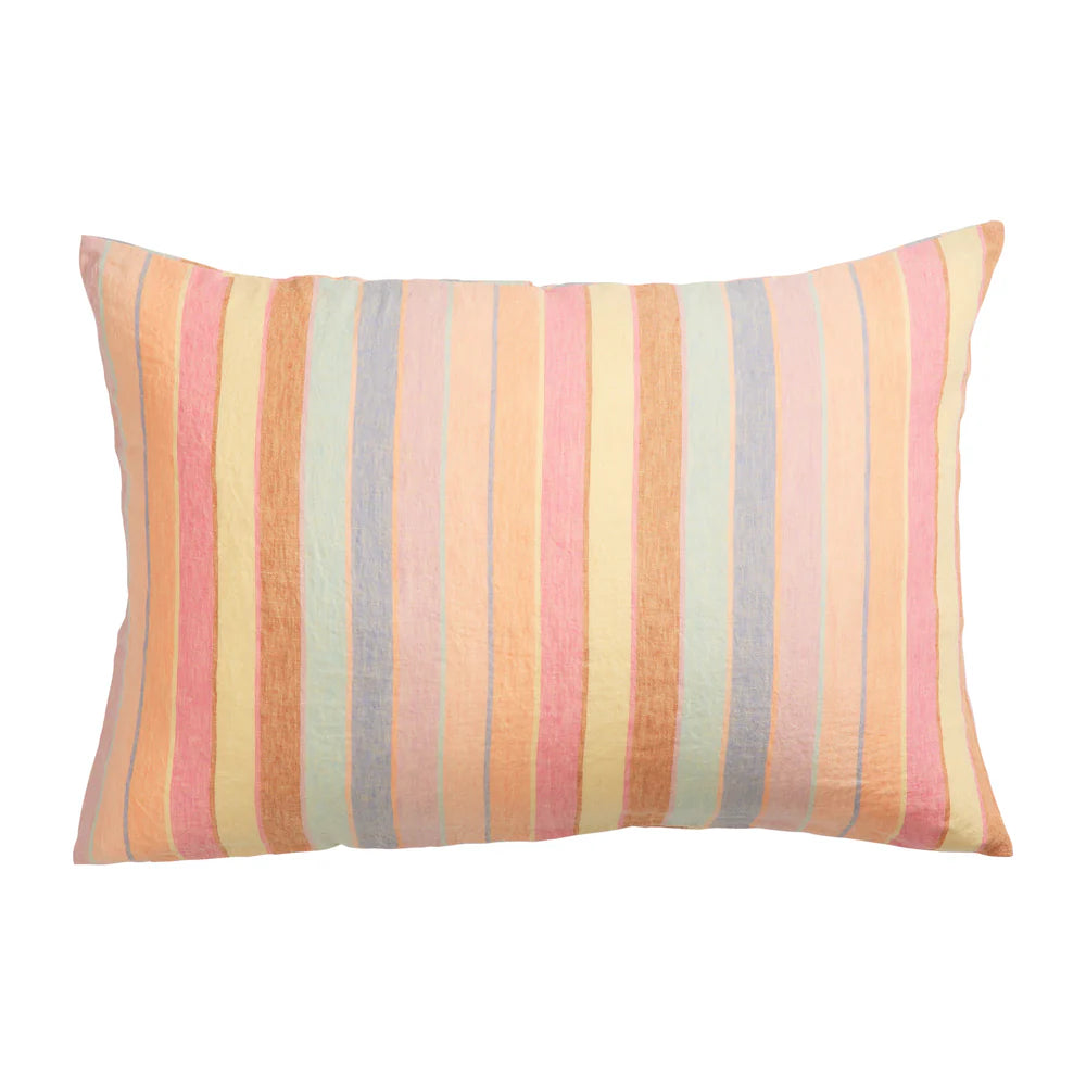 Striped pillow with pastel colors on a white background