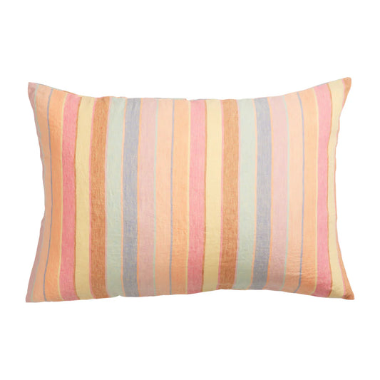 Striped pillow with pastel colors on a white background