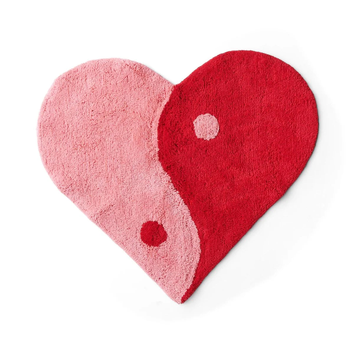 Heart-shaped rug with pink and red design on a white background