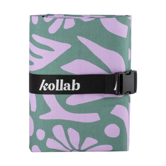 Foldable picnic mat with purple abstract design and 'kollab' branding on a white background