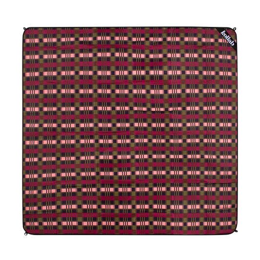 Plaid patterned blanket with visible brand logo on a white background